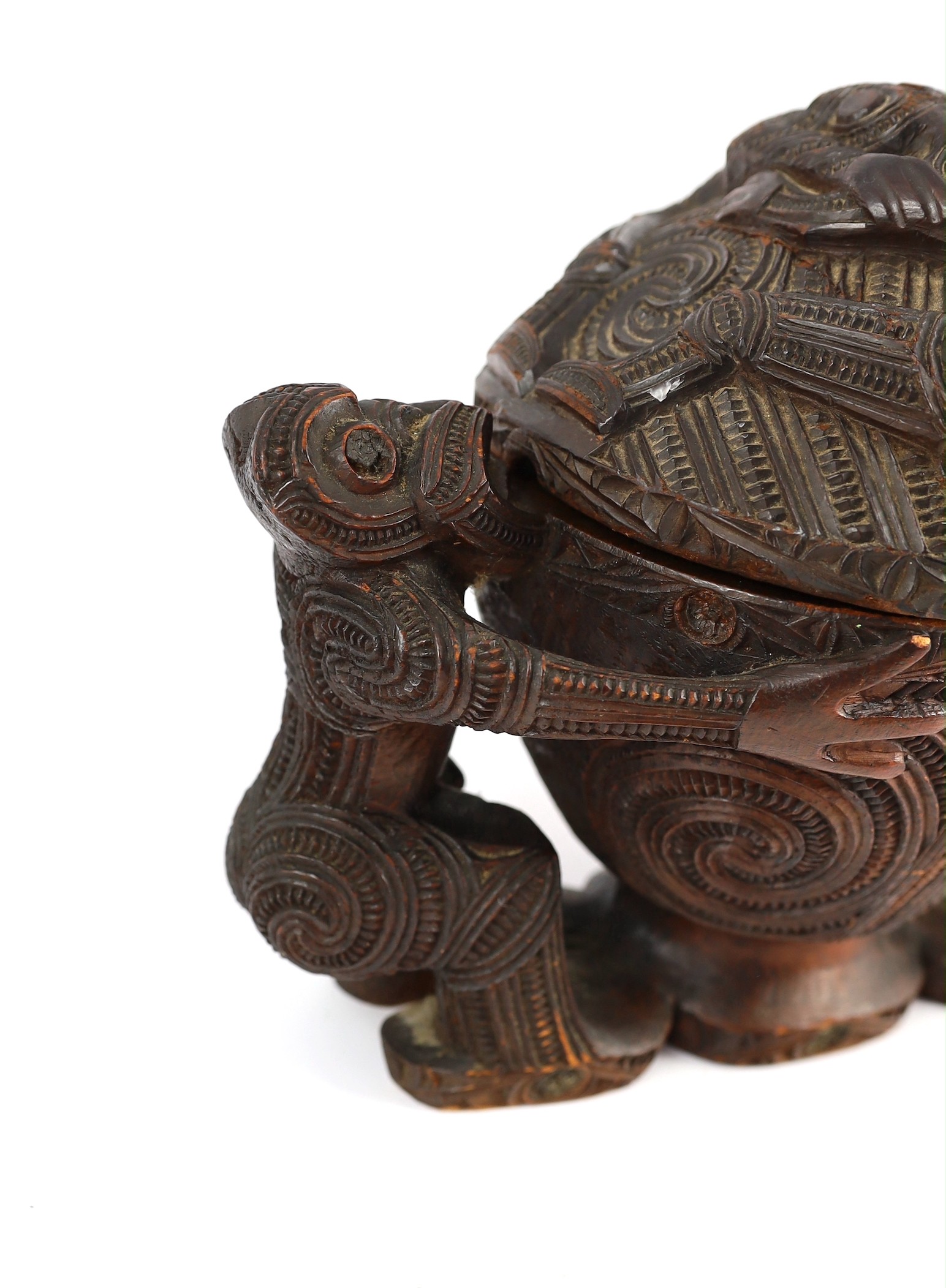 A Maori carved wood oblong bowl and cover, kumete, c.1880-1910, height 23cm length 31cm